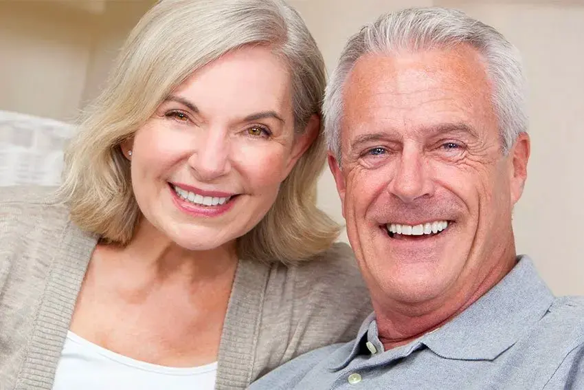 New Fractured Tooth Repair Technique Could Reduce Dental Implant Need_-min mature couple enjoying each other at home